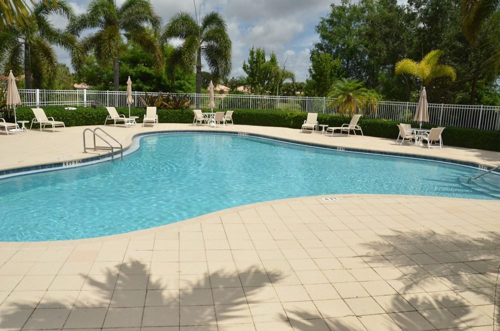 Community pool and lounge chairs